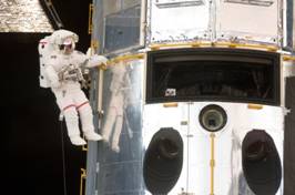 http://www.nature.com/polopoly_fs/7.25286.1429108078!/image/WEB900-Astronaut-John-Grunsfeld-performs-work-on-the-HST-s125e007224.jpg_gen/derivatives/landscape_630/WEB900-Astronaut-John-Grunsfeld-performs-work-on-the-HST-s125e007224.jpg